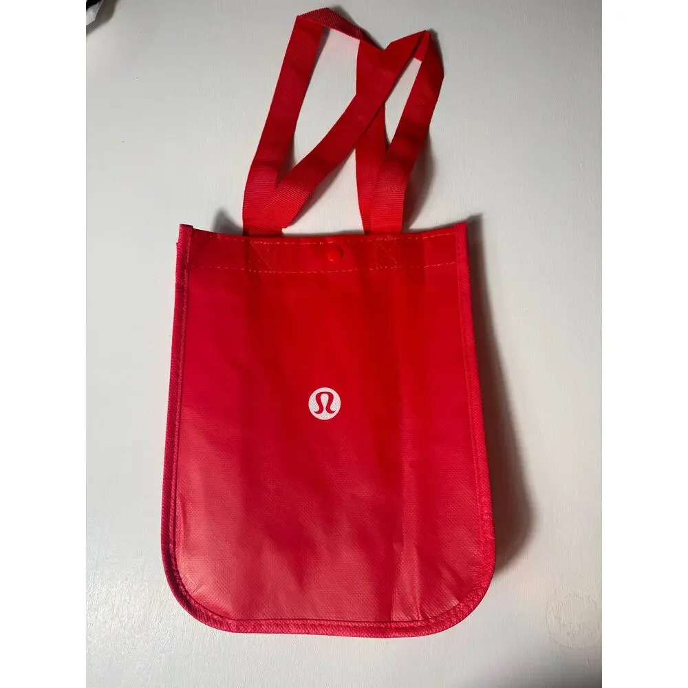 NWOT Lululemon Red Reusable Tote Bag‎ with button clap to close